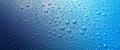 Panoramic banner of water drops on blue metal Royalty Free Stock Photo