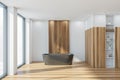 Panoramic bathroom: wooden coatings, dark beige bathtub, white walls