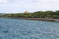 panoramic beach in beautiful muna district with coconut trees Royalty Free Stock Photo