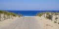 Panoramic beach sea with sand dunes and sandy wooden floor fence access on atlantic ocean in gironde France southwest Royalty Free Stock Photo