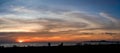 Panoramic beautiful colorful golden hour twilight sky. silhouettes, people meet sunset in tropics, Thailand, Pattaya. Beautiful Royalty Free Stock Photo
