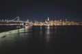 Panoramic beautiful scenic view of the Oakland Bay Bridge and the San Francisco city in the evening, California Royalty Free Stock Photo