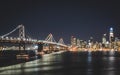 Panoramic beautiful scenic view of the Oakland Bay Bridge and the San Francisco city in the evening, California Royalty Free Stock Photo