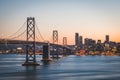 Panoramic beautiful scenic view of the Oakland Bay Bridge and the SF city at dusk, San Francisco, California Royalty Free Stock Photo