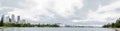 Panoramic of Beautiful view of Sydney Harbour, the image shows the landmark ` Opera house` Cityscape in cloudy day. Royalty Free Stock Photo