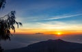 Panoramic beautiful view from top of the volcano Agung at dawn. View of the rising sun and Rinjani mount on the horizon from a