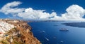 Panoramic bird eye aerial view of white building, blue sky and vivid sea in Santorini island, Oia, Greece Royalty Free Stock Photo