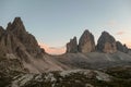 A panoramic capture of the sunset above Tre Cime di Lavaredo (Drei Zinnen) and surrounding mountains in Italian Dolomites. Royalty Free Stock Photo