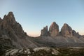 A panoramic capture of the sunset above Tre Cime di Lavaredo (Drei Zinnen) and surrounding mountains in Italian Dolomites. Royalty Free Stock Photo