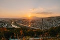 Panoramic City Sunset Overlooking a River Valley and Suspension Bridge from a High Vantage Point Royalty Free Stock Photo
