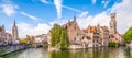 Panoramic city view Belfry tower and famous canal in Bruges, Belgium.