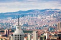 Panoramic cityscape of Ankara, Turkey with a helicopter flying over the city