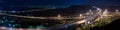 Panoramic cityscape of freeway in night