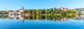 Panoramic cityscape of Litomerice reflected in Labe River, Czech Republic Royalty Free Stock Photo