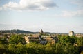 Panoramic cityscape view of Rome with historic architecture and green trees under blue sky Royalty Free Stock Photo