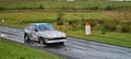 Panoramic closeup of an offload rally car on a rainy day at Walters arena, United Kingdom