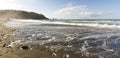 Panoramic Coastal Landscape with Stones, Mist, Trees, Sky and Sea Royalty Free Stock Photo