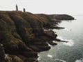 Panoramic coastline shore cliff view at Cap Frehel lighthouse peninsula atlantic ocean Cotes dArmor Brittany France