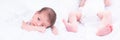 Panoramic collage of a lying blue-eyed Hispanic baby and her feet on white sheets