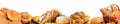 Panoramic collection of bread products.