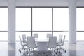 Panoramic conference room in modern office, copy space view from the windows. White chairs and a white round table.