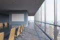 Panoramic conference room in modern office in New York City. Brown chairs and a black table.