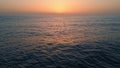 Panoramic dawn marine landscape drone view. Sunset reflecting calm lapping water Royalty Free Stock Photo