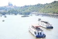 Panoramic detail of Prague with boats in Vltava river