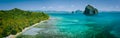 Panoramic drone aerial view of coastal scenery from the mainland Palawan with tropical Pinagbuyutan islands on horizon