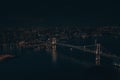 Aerial drone photo - Rainbow Bridge and the skyline of Tokyo at night. Capital city of Japan. Royalty Free Stock Photo