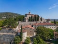 Panoramic drone view of the hill (colle Cidneo) with old castle and park in the center of Brescia