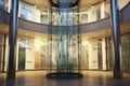 Panoramic elevator in atrium 1695523867831 3 Royalty Free Stock Photo