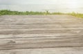 Panoramic empty clean wood counter table top blur shinny white bokeh light on summer beach background for product morning scene