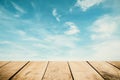 Panoramic empty grunge wood counter table top on blue sky white light bokeh background for product morning scene spring display Royalty Free Stock Photo