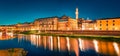 Panoramic evening cityscape of Florence with Old Palace Palazzo Vecchio or Palazzo della Signoria on background and Ponte Vecchi Royalty Free Stock Photo