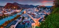 Panoramic evening cityscape of Salzburg, Old City, birthplace of famed composer Mozart. Fantastic autumn scene of Eastern Alps.Spl