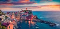 Panoramic evening cityscape of Vernazza port, Cinque Terre region. Unbelievable summer sunset on Liguria, Italy, Europe. Superb se Royalty Free Stock Photo