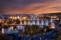 Panoramic evening view to the lit cityscape of Prague, Czech Republic