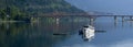 A panoramic of a fishing boat moored in the water. Royalty Free Stock Photo
