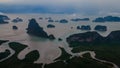 Panoramic foggy landscape view of the tropical islands. Samet Nangshe. Thailand. Cloudy weather. Rainy day. Drone.