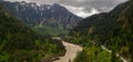 Panoramic format photo of the fresh spring green foliage in the Lillooet-Fraser Canyon, British Columbia, Canada