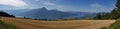 Panoramic of the French Alps : field in foreground of the lake of Serre Poncon
