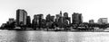 Panoramic grayscale of the skyline of Boston cityscape with its skyscrapers and harbor Royalty Free Stock Photo