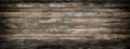 Panoramic grey grunge background of old wooden boards with vignette. Royalty Free Stock Photo