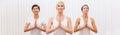 Panoramic Group of Three Beautiful Women Practising Yoga