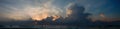 Panoramic hi res combo of sunrise with clouds Royalty Free Stock Photo