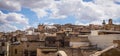 Panoramic high angle view of the old Fez city in Morocco under the cloudy sky Royalty Free Stock Photo