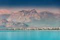 idyllic view of the sea coast in Antalya. Taurus mountains in the background and the blue Bay of the Mediterranean sea Royalty Free Stock Photo