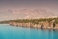 idyllic view of the sea coast in Antalya. Taurus mountains in the background and the blue Bay of the Mediterranean sea Royalty Free Stock Photo