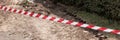 Panoramic image. Barrier red and white tape Royalty Free Stock Photo